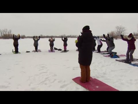 Yoga Lovers Bundle Up For a Wintery Class on Icy Pond